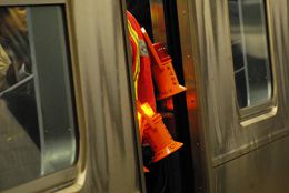 A tunnel worker in orange
